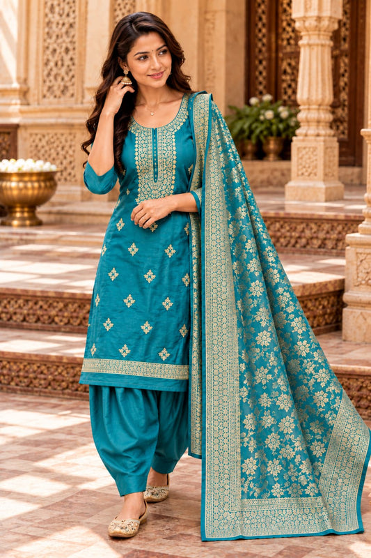 Teal blue silk blend kurta with gold-toned floral embroidery