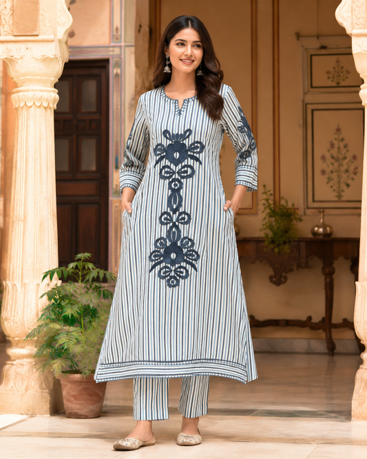 Blue and white striped yarn embroidered A-line kurta set with matching pant by Odhanibymann