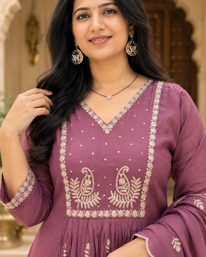Golden embroidery detail on a mauve muslin silk kurta