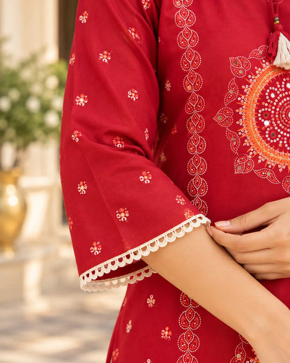 Mandala motif and mirror-look neckline detail on a red kurta