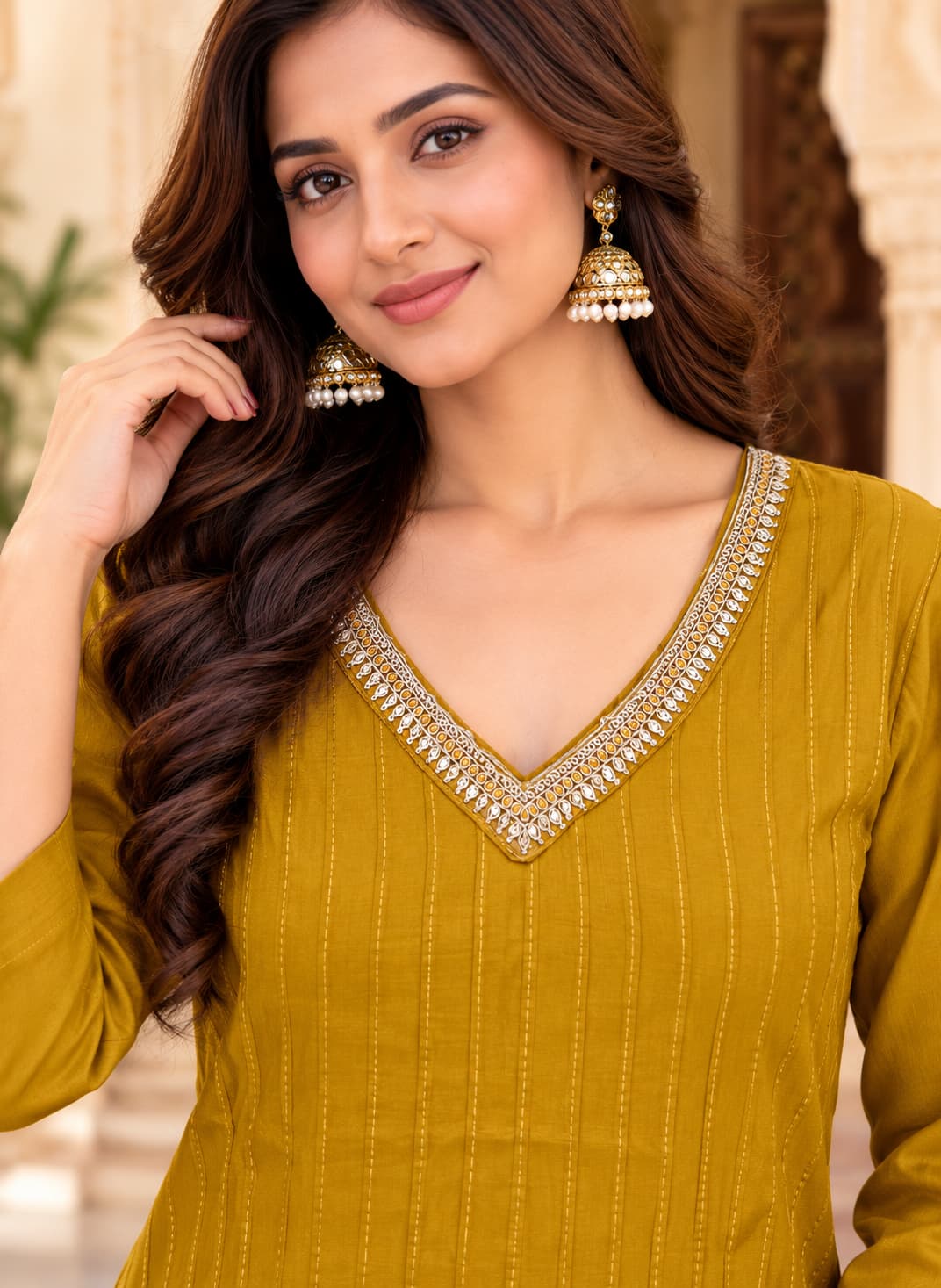 Mustard short kurti with lace-trimmed V-neck and golden stripes