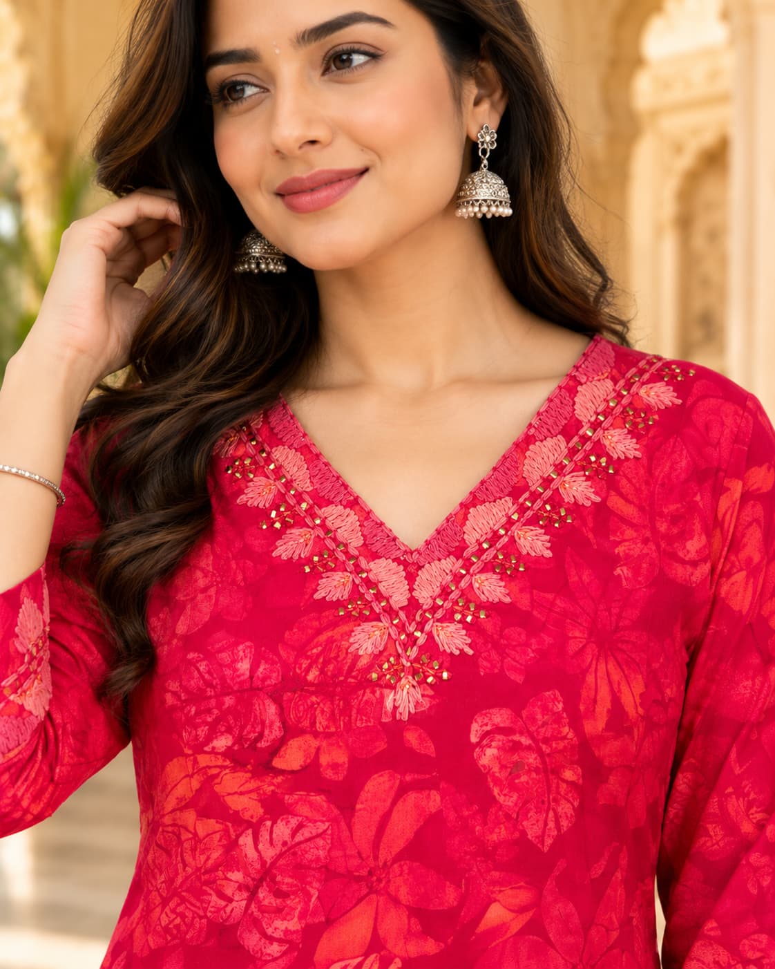 Fuchsia floral rayon kurta styled with white pants, pants not included