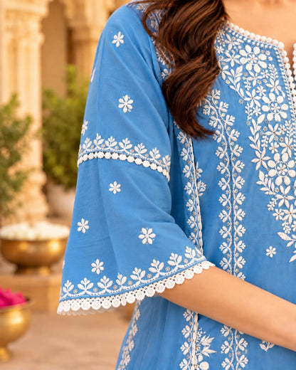 Embroidered notched neckline on a powder blue kurta