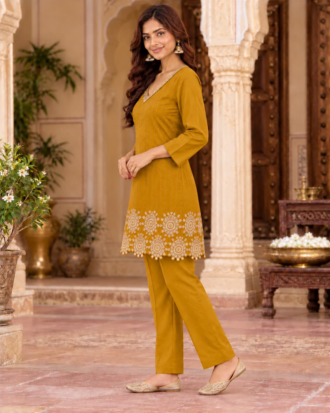 Mustard muslin co-ord set styled with gold juttis and jhumkas