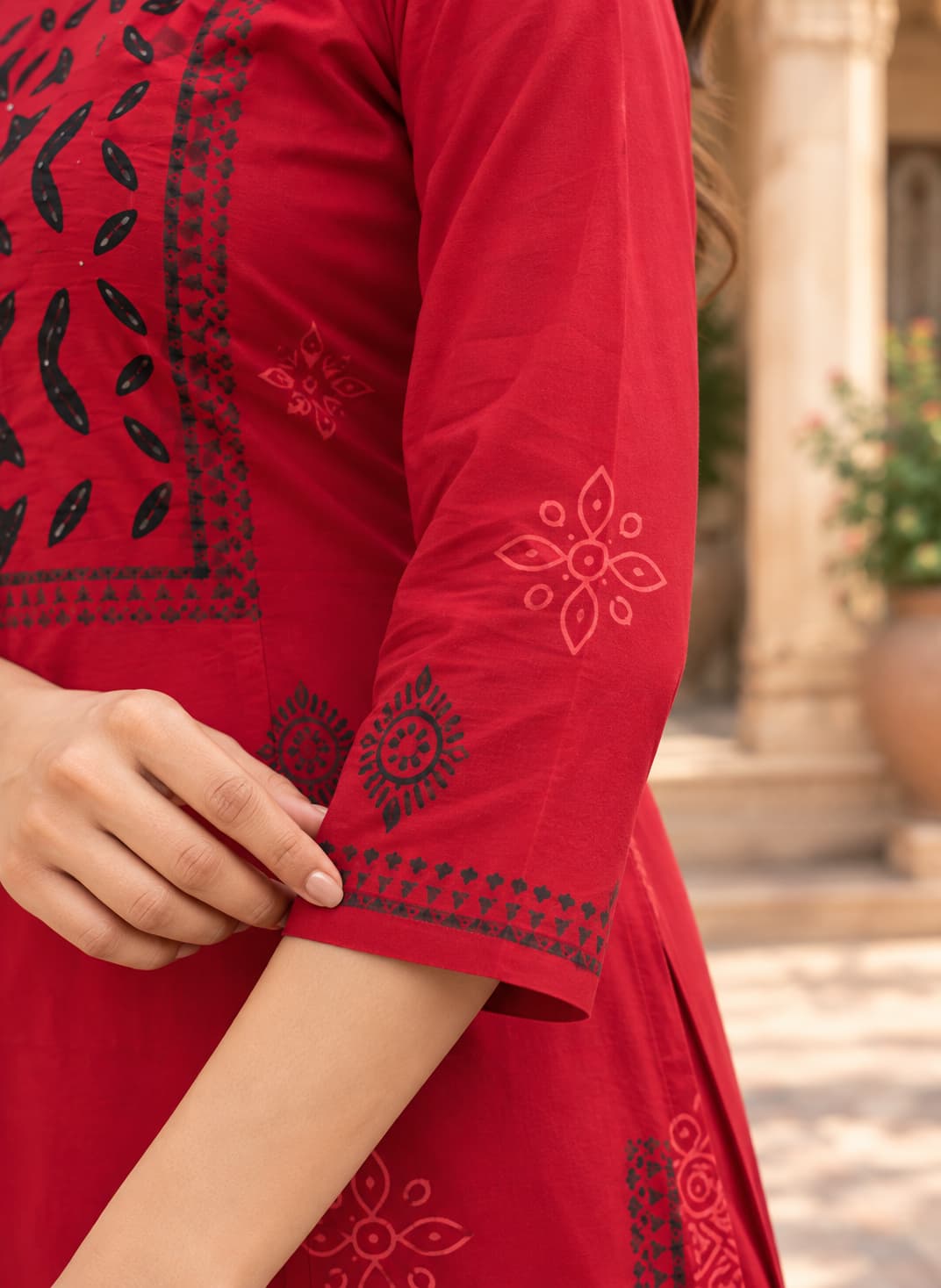 Three-piece red cotton kurta, matching pants and black dupatta set