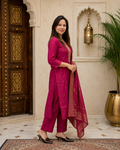 Three-piece magenta festive kurta set with kurta, pant and dupatta