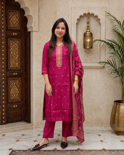 Magenta zari-look kurta set styled for festive wear
