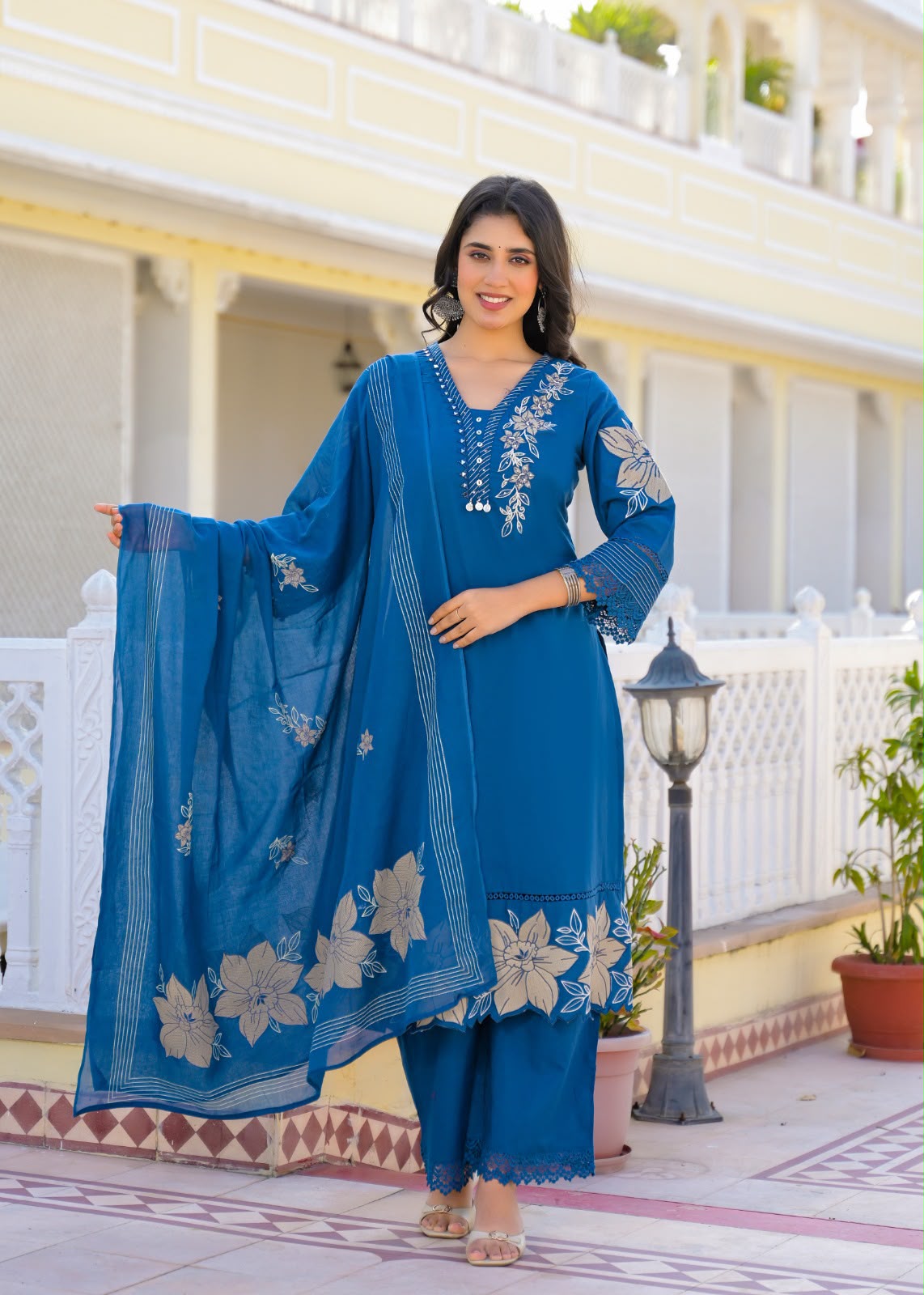 Blue kurta set for women with floral embroidery, three-quarter sleeves and coordinated floral dupatta — front view